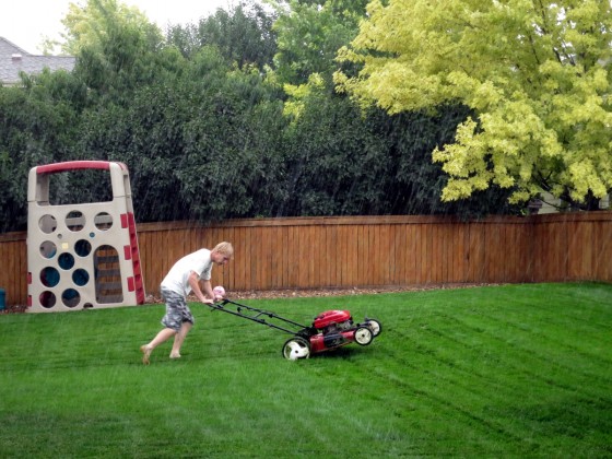 alex-mowing-in-the-rain